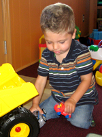 Owen with his trucks